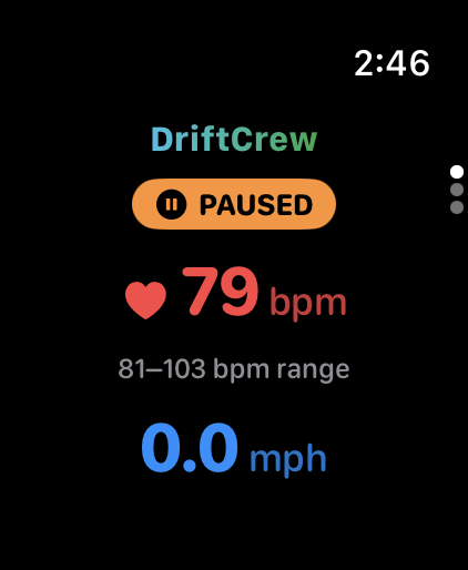 Apple Watch showing live heart rate and a paused session